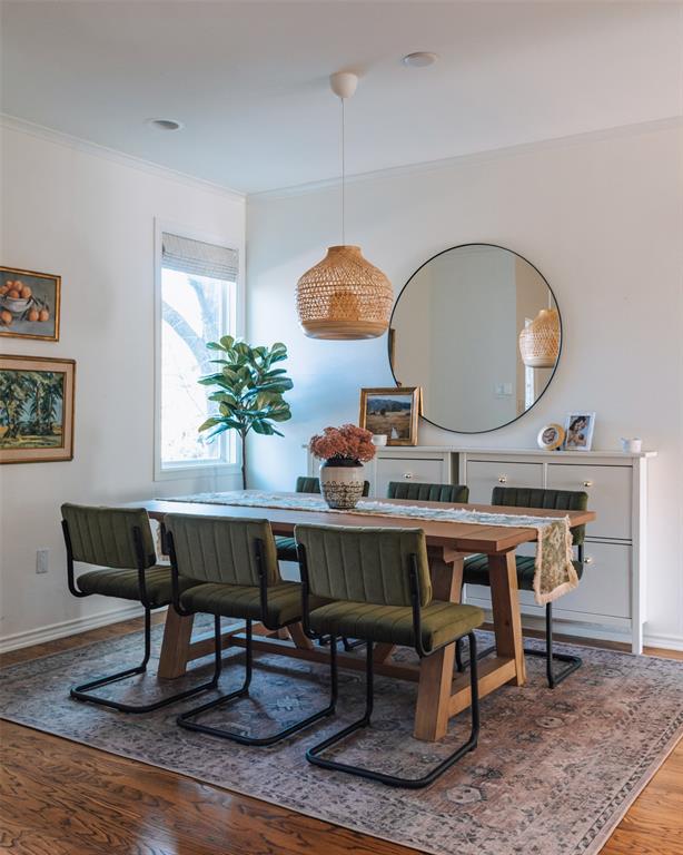 4040 Avondale Avenue, Unit 107 Dallas, TX 75219 - Photo 3 of 33 a view of a dining room with furniture window and wooden floor