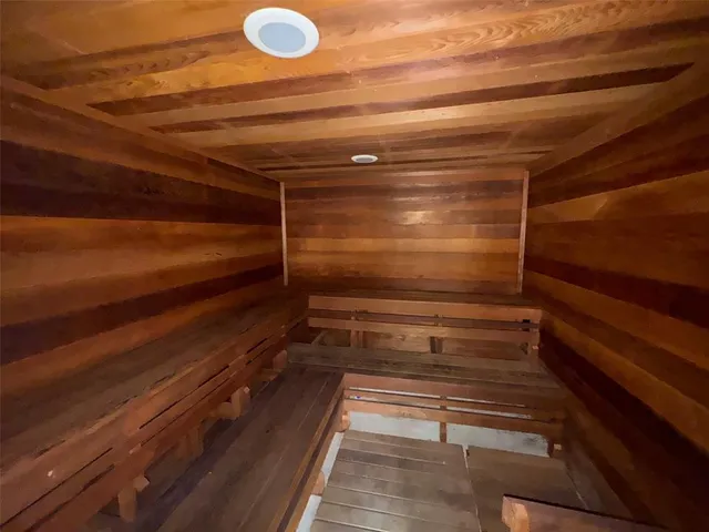 a view of room with wooden floor