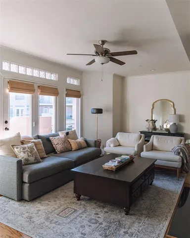 a living room with furniture and a window