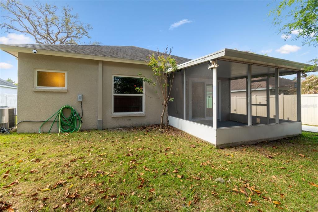 5311 Watson Road Riverview, FL 33578 - Photo 32 of 33 a backyard of a house