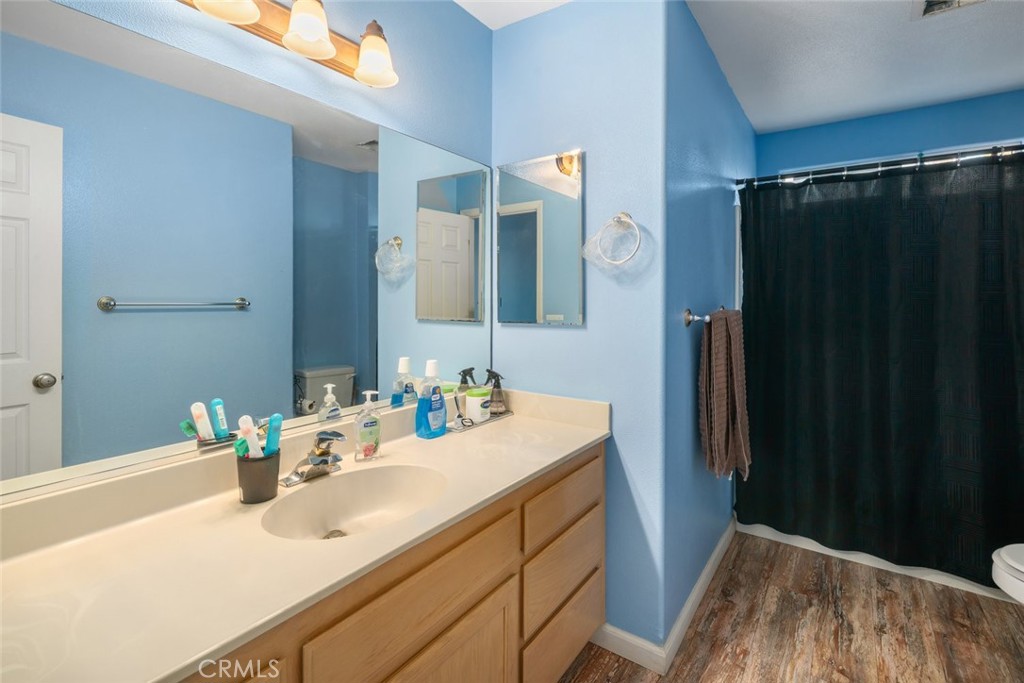 1681 Ocean Street Oceano, CA 93445 - Photo 15 of 25 a bathroom with a sink vanity and a mirror