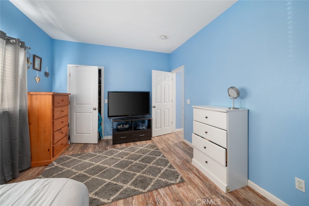 1681 Ocean Street Oceano, CA 93445 - Photo 20 of 25 a room with furniture and a flat screen tv