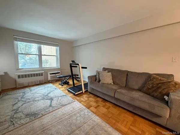 a living room with a couch and a table