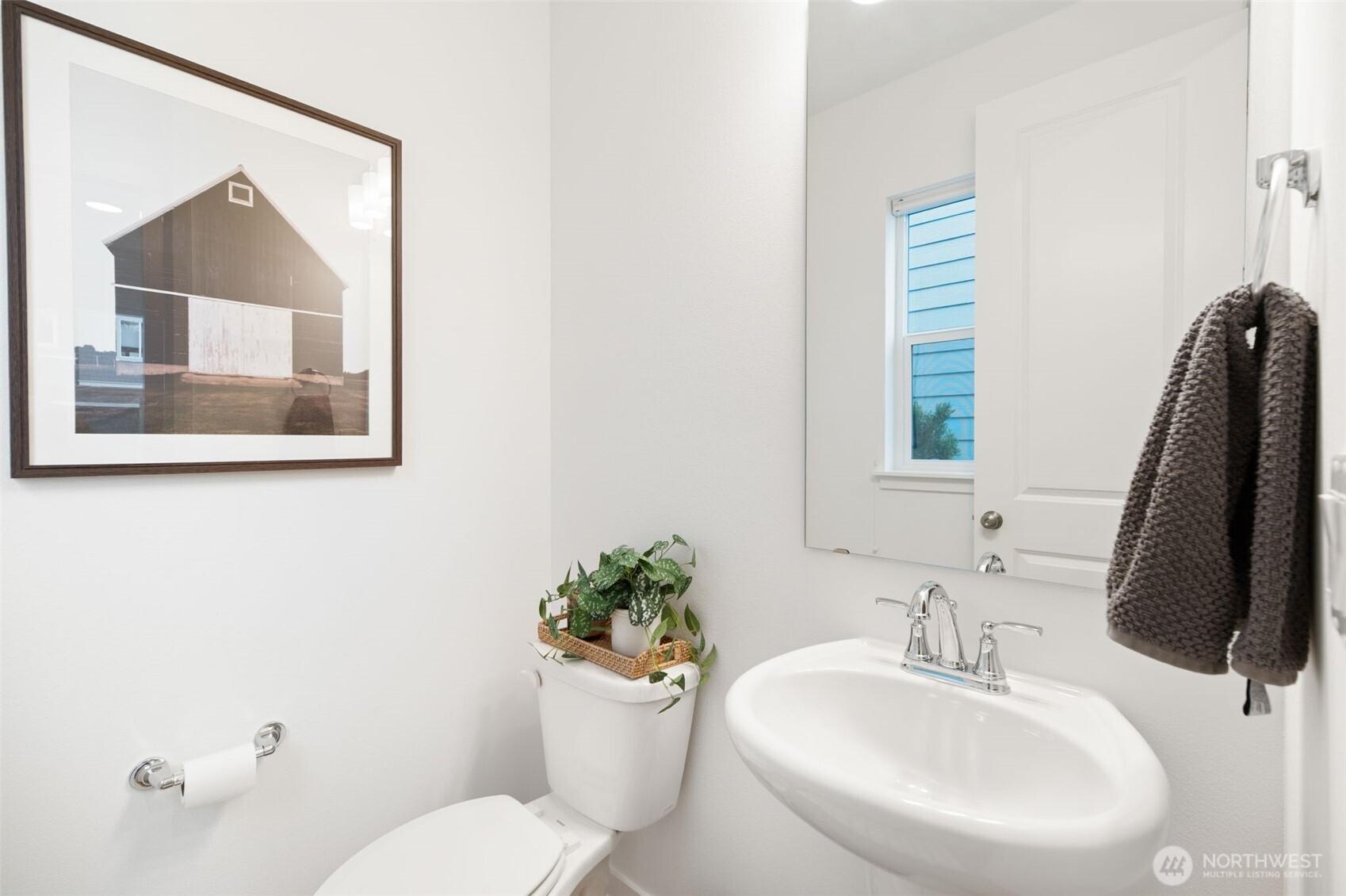 20709 137th Street Southeast Monroe, WA 98272 - Photo 23 of 40 a bathroom with a toilet sink and mirror