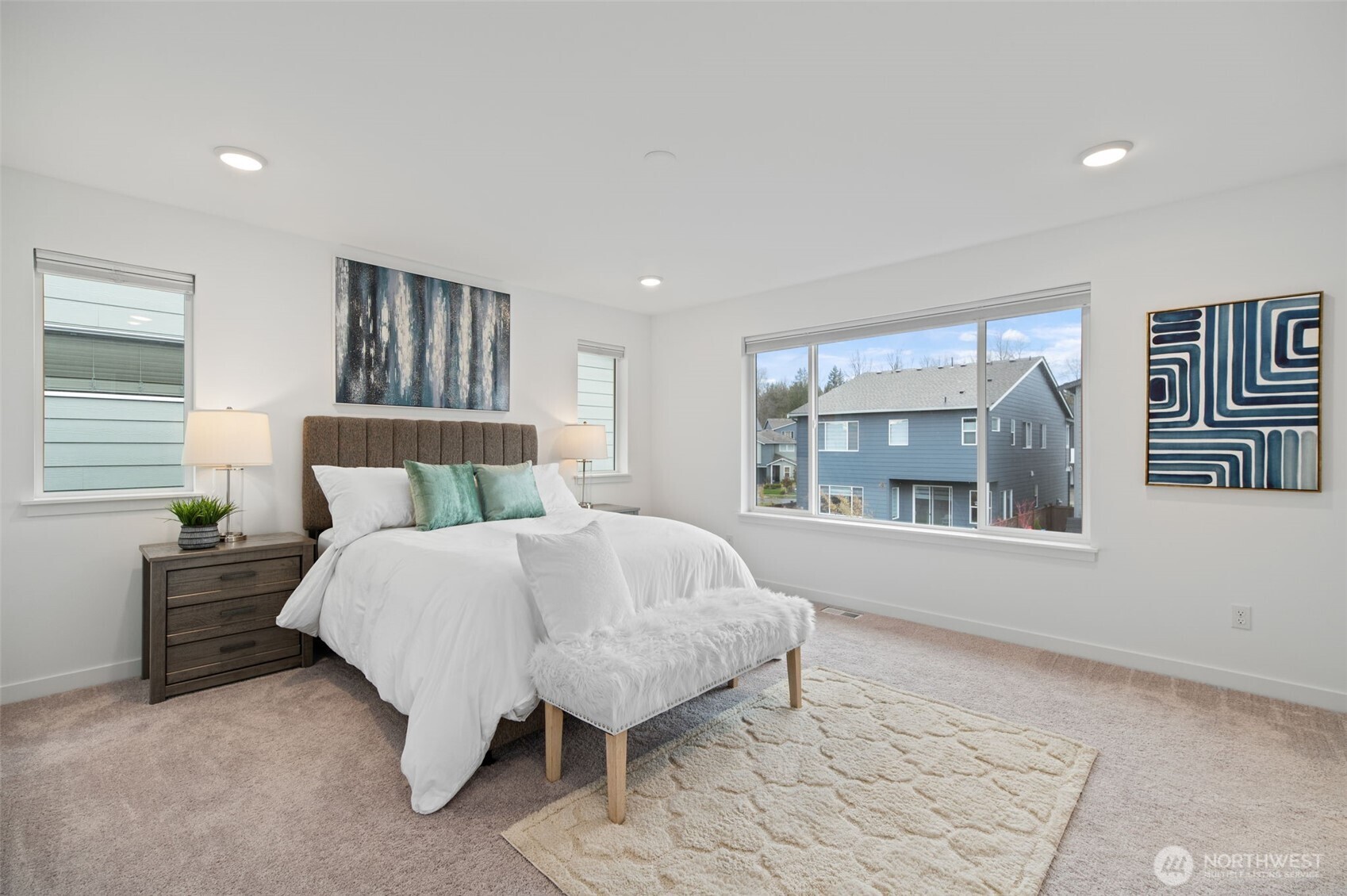20709 137th Street Southeast Monroe, WA 98272 - Photo 24 of 40 a bedroom with a bed and a large window
