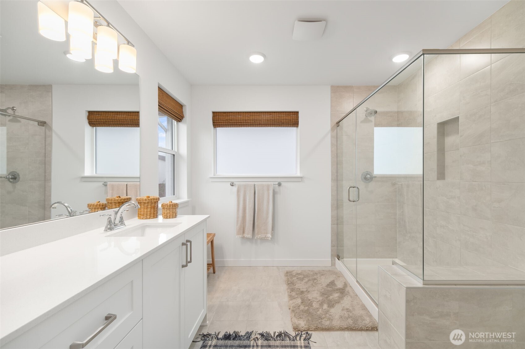 20709 137th Street Southeast Monroe, WA 98272 - Photo 26 of 40 a bathroom with a sink a toilet and shower