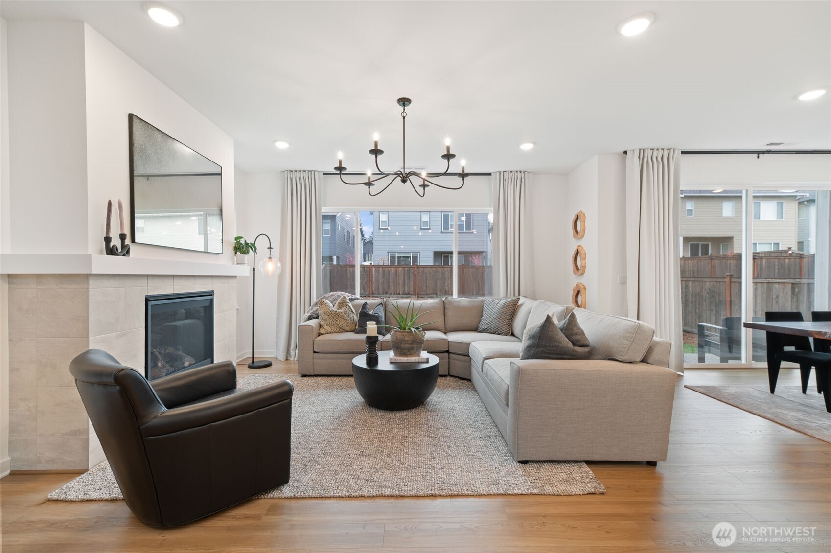 20709 137th Street Southeast Monroe, WA 98272 - Photo 5 of 40 a living room with furniture and a fireplace