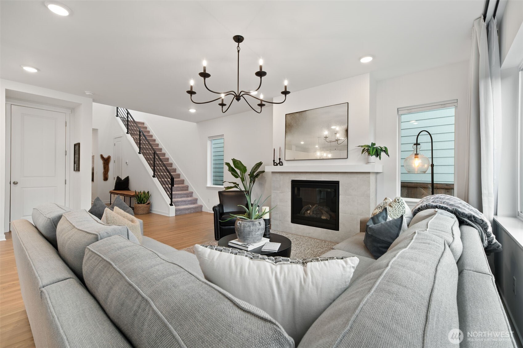 20709 137th Street Southeast Monroe, WA 98272 - Photo 9 of 40 a living room with furniture and a fireplace