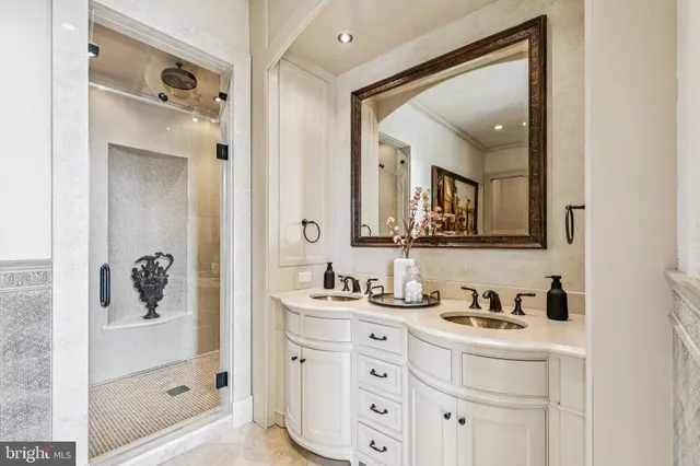 a bathroom with a bathtub and shower