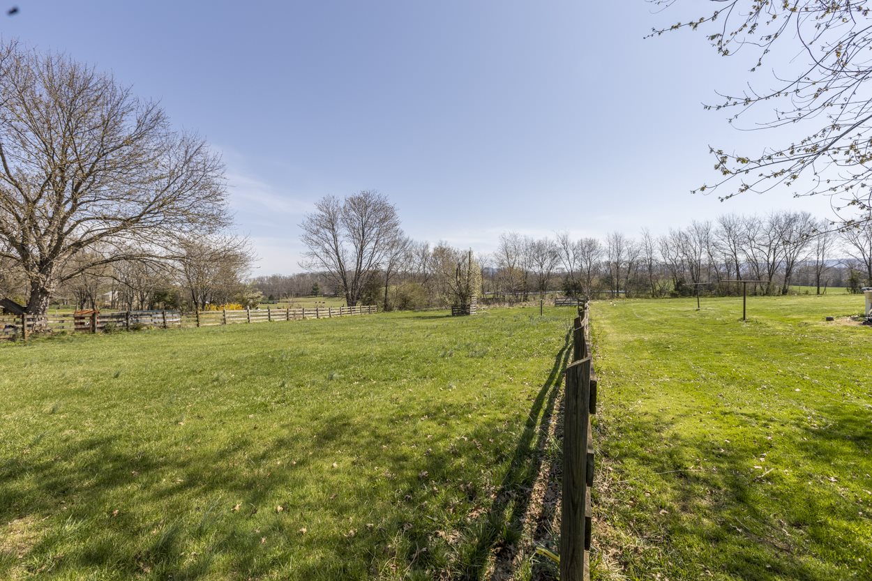 713 Battlefield Road Fort Defiance, VA 24437 - Photo 22 of 47 a view of a golf course with a lake