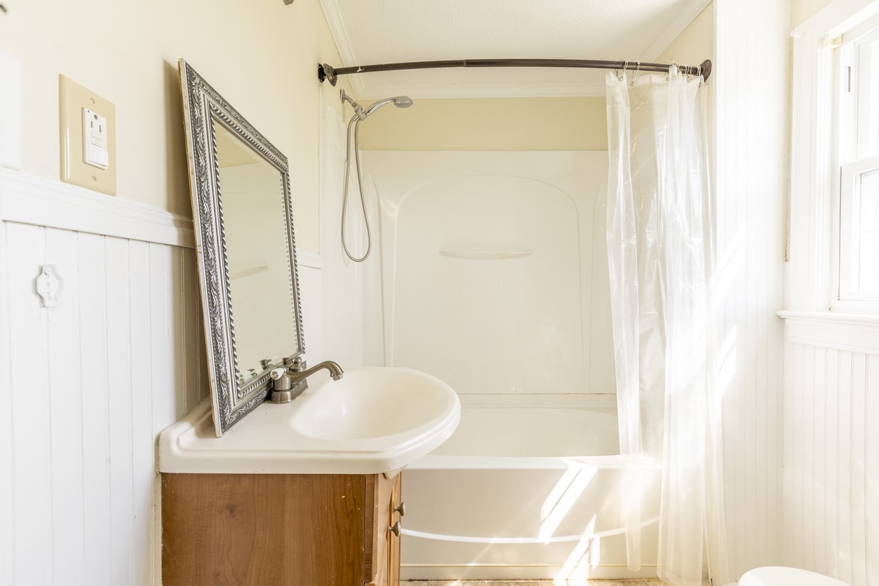 713 Battlefield Road Fort Defiance, VA 24437 - Photo 40 of 47 a bathroom with a sink and a mirror