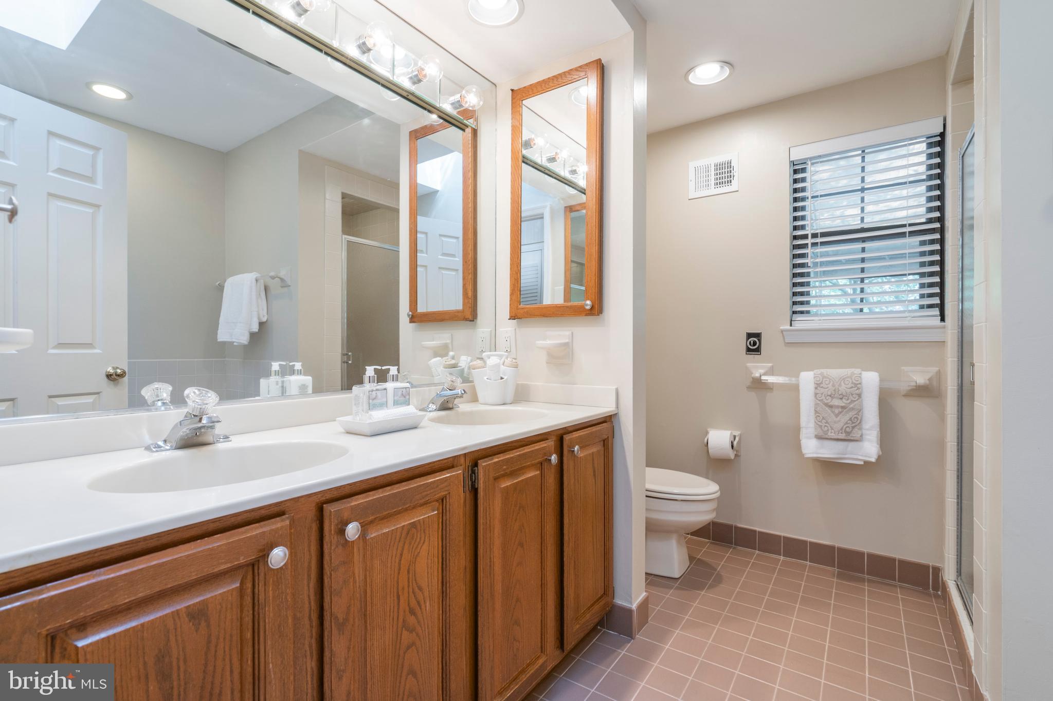 14 Highfield Lane Wayne, PA 19087 - Photo 23 of 42 1st Floor Master Bathroom w/ Stall Shower & Tub!
