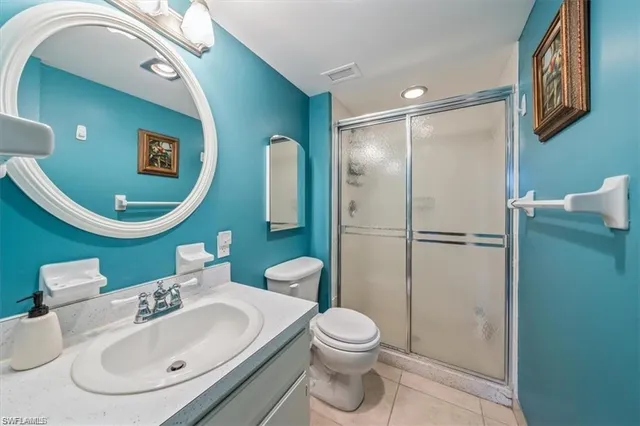 a kitchen with stainless steel appliances a refrigerator and a sink