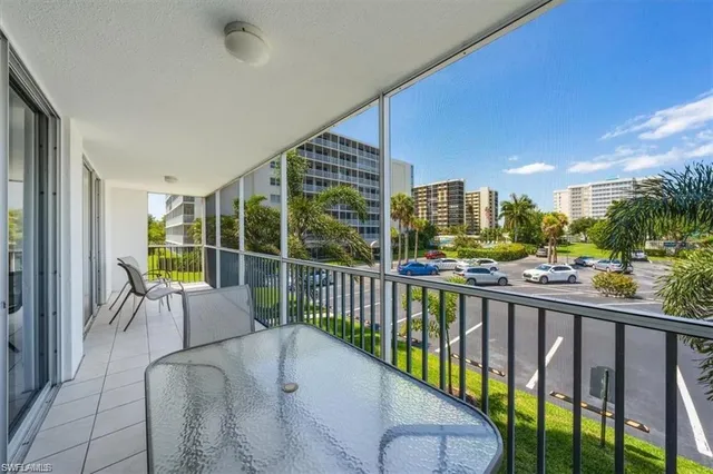 a view of balcony with furniture