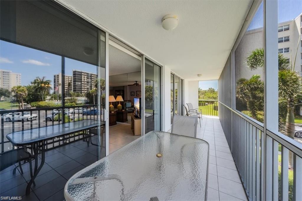 3 Bluebill Avenue, Unit 207 Naples, FL 34108 - Photo 4 of 32 a lobby with entryway