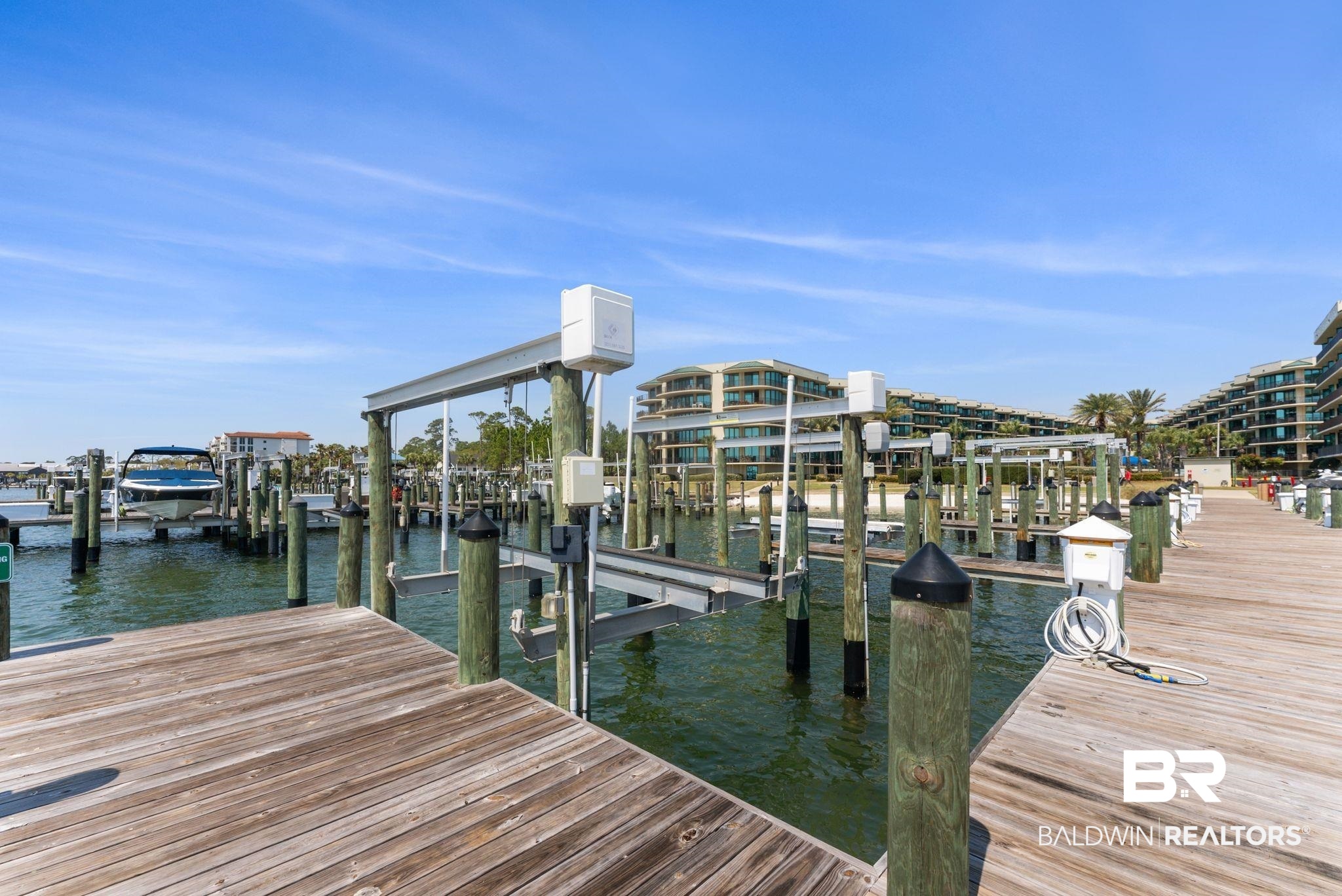 27580 Canal Road, Unit 1233 Orange Beach, AL 36561 - Photo 56 of 79 Dock featuring a water view and boat lift