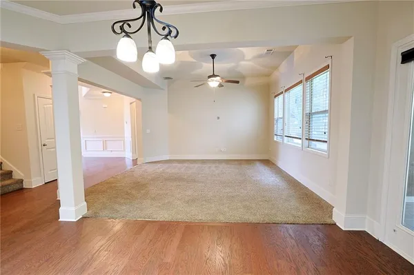 a kitchen with stainless steel appliances granite countertop a sink a stove top oven a counter space and cabinets