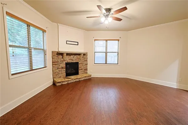 a bed room with bed and window