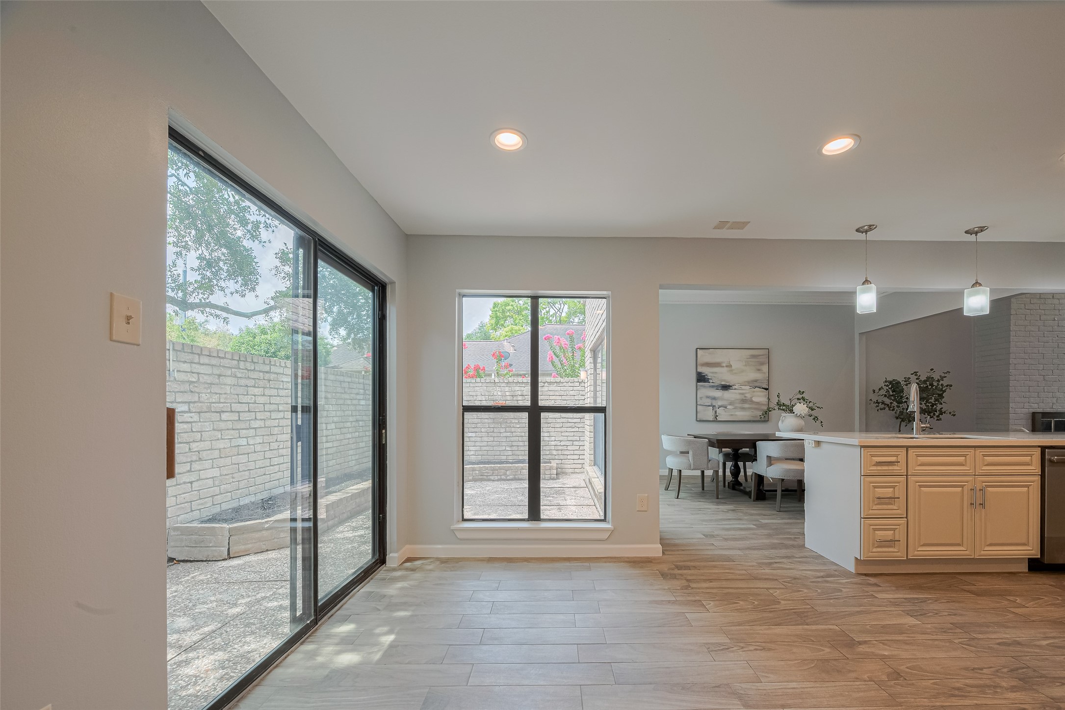 15600 Barkers Landing Road, Unit 20 Houston, TX 77079 - Photo 22 of 49 This photo shows the breakfast room area. Sliding doors lead to a large patio area where you can accommodate some patio furniture and enjoy some Texas BBQ since it's just steps from the kitchen.