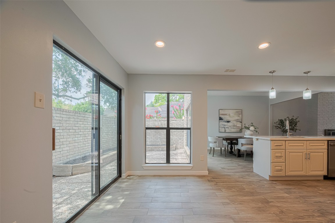 15600 Barkers Landing Road, Unit 20 Houston, TX 77079 - Photo 22 of 49 This photo shows the breakfast room area. Sliding doors lead to a large patio area where you can accommodate some patio furniture and enjoy some Texas BBQ since it's just steps from the kitchen.