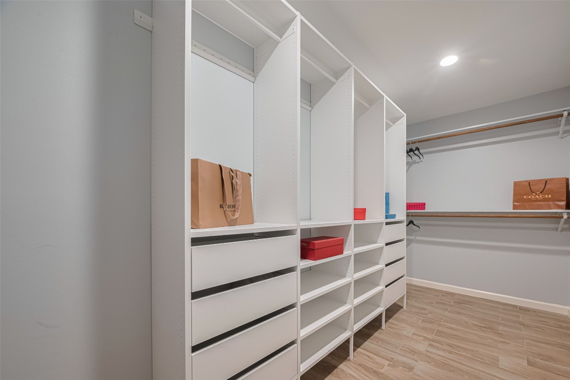 15600 Barkers Landing Road, Unit 20 Houston, TX 77079 - Photo 36 of 49 Hanging rods and drawers to organize your clothing.