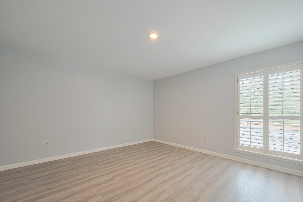 15600 Barkers Landing Road, Unit 20 Houston, TX 77079 - Photo 42 of 49 This is the 2nd bedroom upstairs with large window with plantation shutters for an elegant feel.