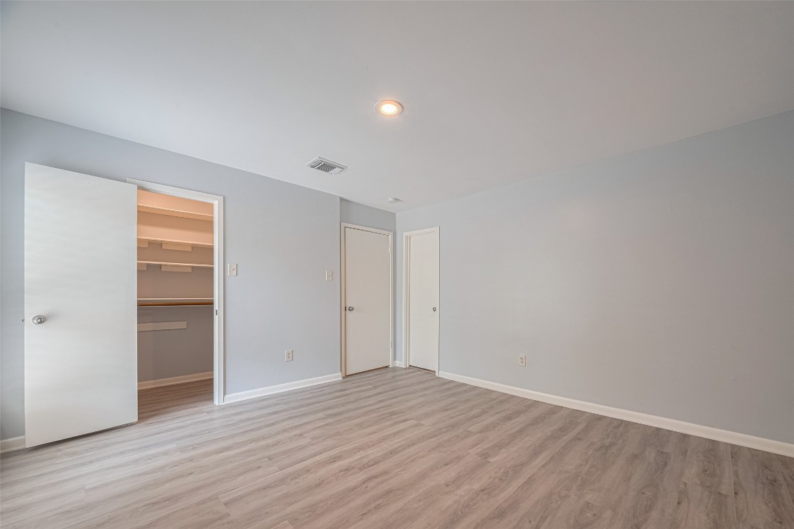 15600 Barkers Landing Road, Unit 20 Houston, TX 77079 - Photo 44 of 49 Notice the door to the right. It leads to the ensuite bathroom.