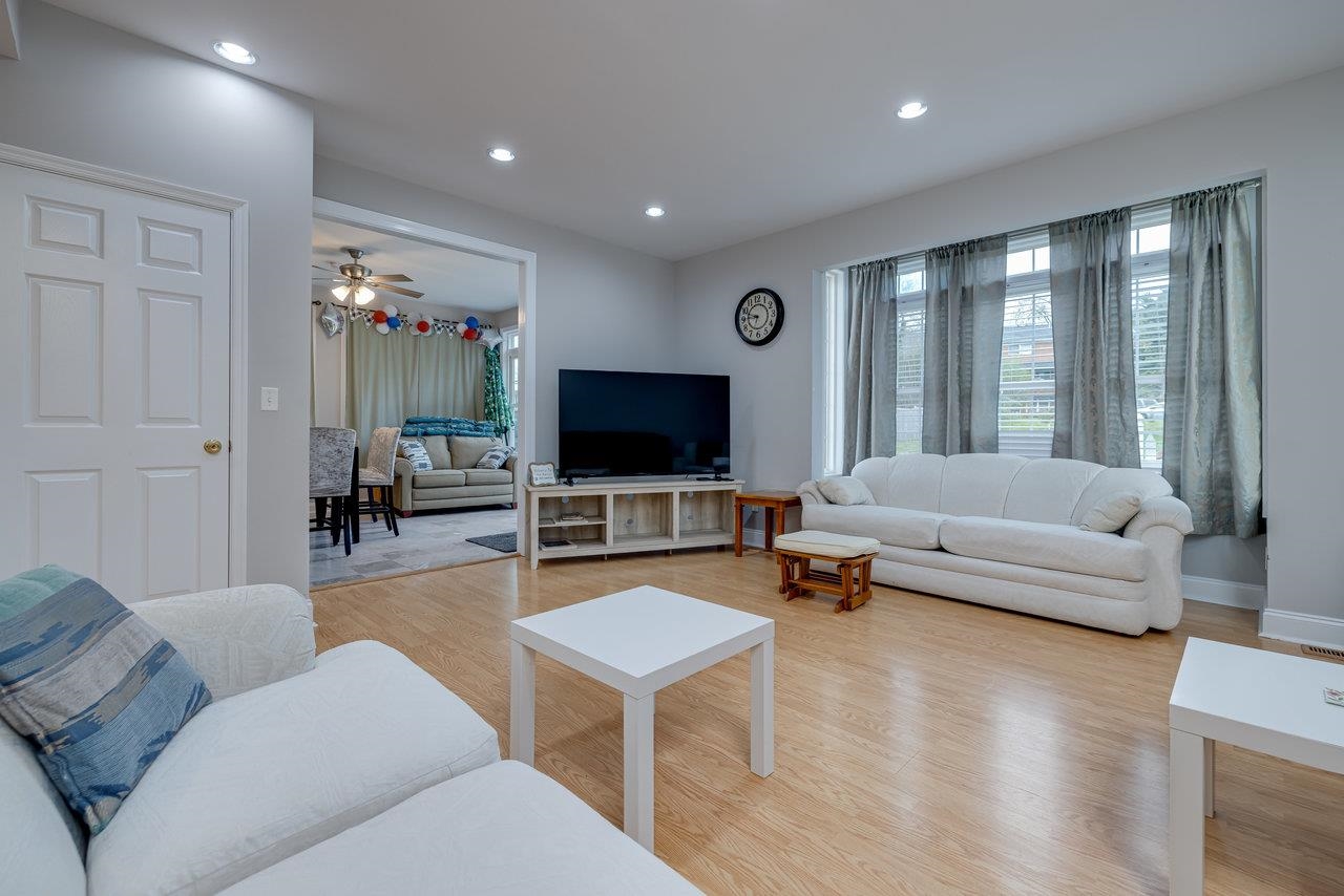 155 Main Street Dayton, VA 22821 - Photo 16 of 75 a living room with furniture and a flat screen tv