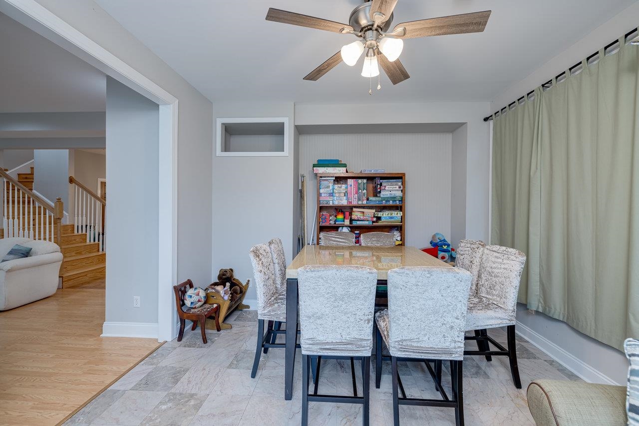 155 Main Street Dayton, VA 22821 - Photo 18 of 75 a view of a dining room with furniture window and wooden floor