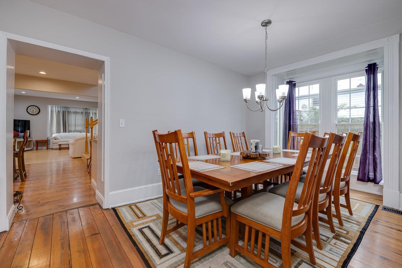 155 Main Street Dayton, VA 22821 - Photo 20 of 75 a view of a dining room with furniture window and wooden floor