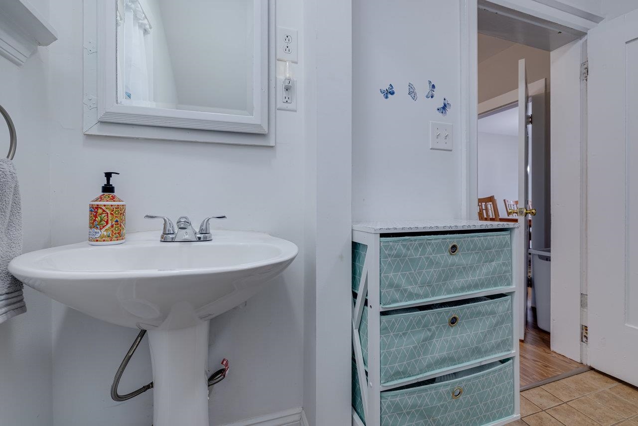 155 Main Street Dayton, VA 22821 - Photo 30 of 75 a bathroom with a sink and mirror