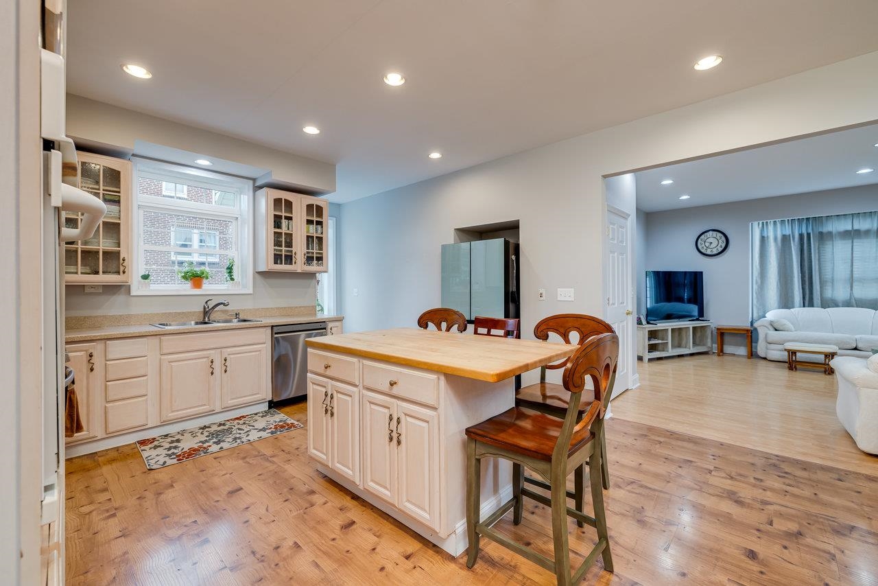 155 Main Street Dayton, VA 22821 - Photo 3 of 75 a kitchen that has a lot of cabinets in it and wooden floors