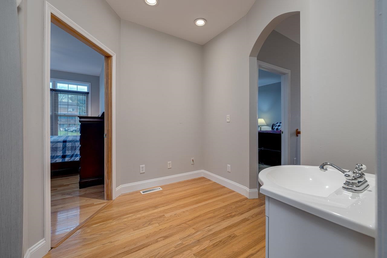 155 Main Street Dayton, VA 22821 - Photo 41 of 75 a bathroom with a sink and a mirror