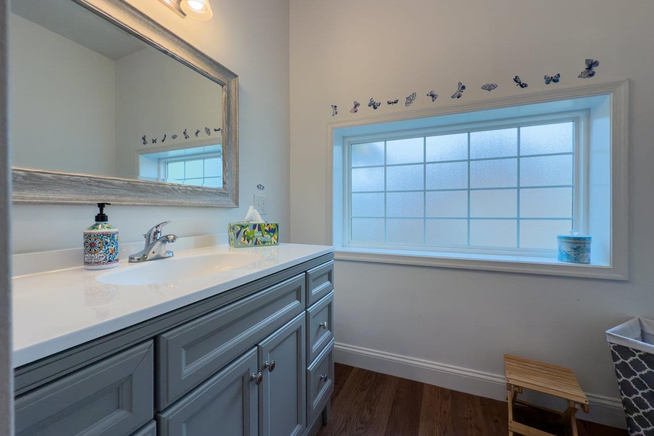 155 Main Street Dayton, VA 22821 - Photo 43 of 75 a bathroom with a sink and a mirror
