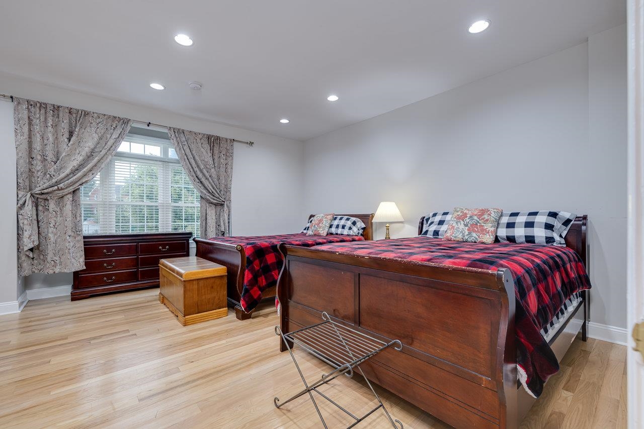 155 Main Street Dayton, VA 22821 - Photo 46 of 75 a bed room with a bed and a chair