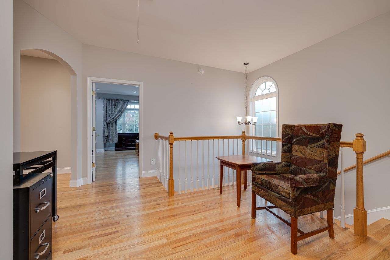 155 Main Street Dayton, VA 22821 - Photo 51 of 75 a living room with furniture and a wooden floor