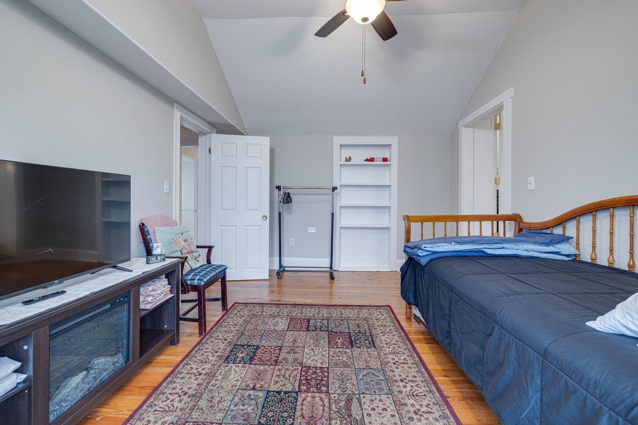 155 Main Street Dayton, VA 22821 - Photo 57 of 75 a bedroom with furniture and flat screen tv