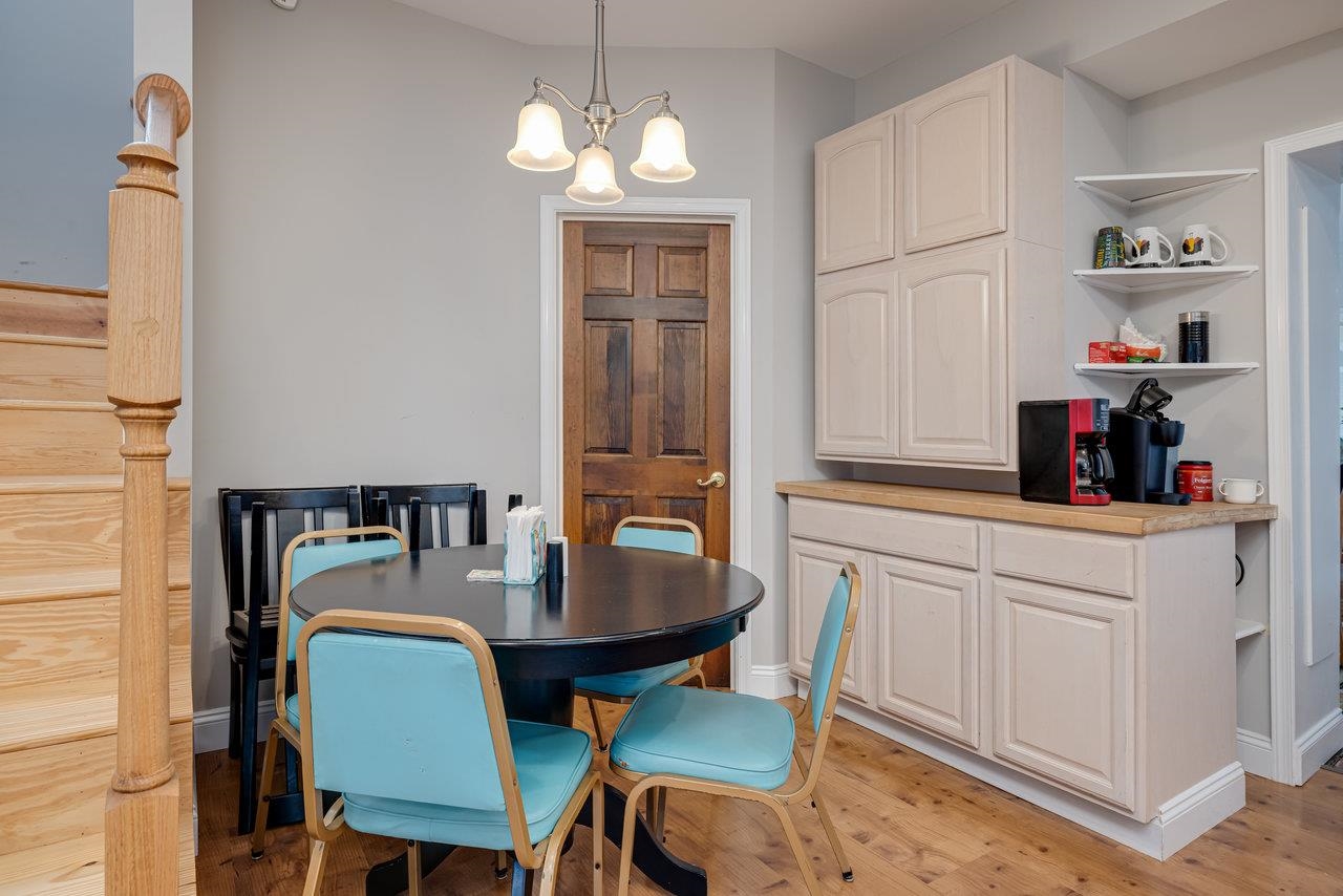 155 Main Street Dayton, VA 22821 - Photo 8 of 75 a view of a dining room with furniture and chandelier