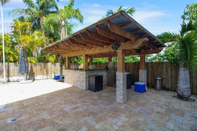 a view of a swimming pool with a patio
