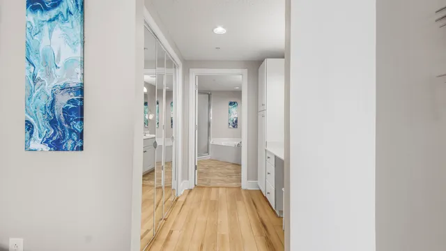 a en suite bathroom with a sink a mirror and a shower