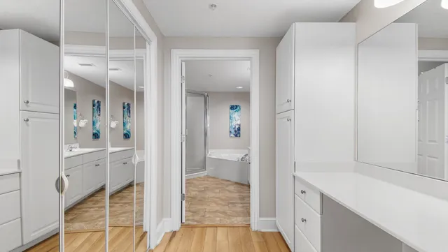 a bathroom with a shower and a bathtub