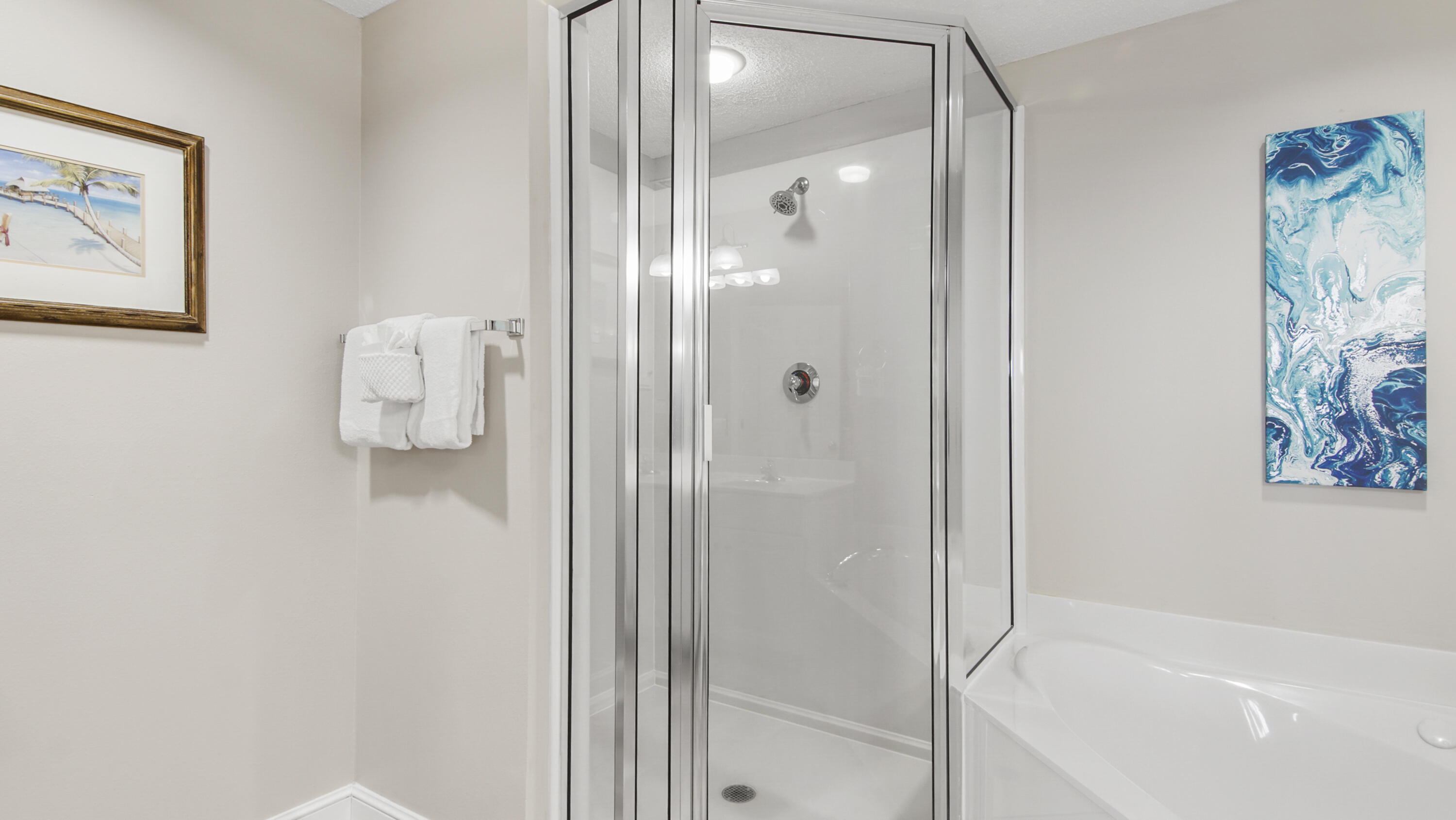 10811 Front Beach Road, Unit 1405 Panama City Beach, FL 32408 - Photo 31 of 76 a bathroom with a bathtub and shower