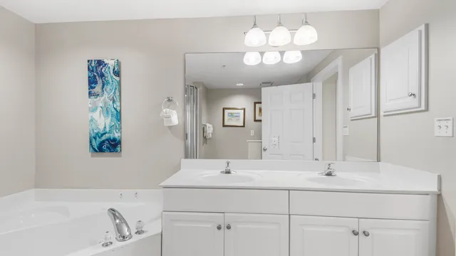 a view of a swimming pool with a lounge chair