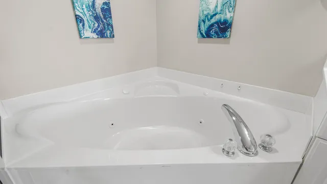 an aerial view of residential house with outdoor space and swimming pool