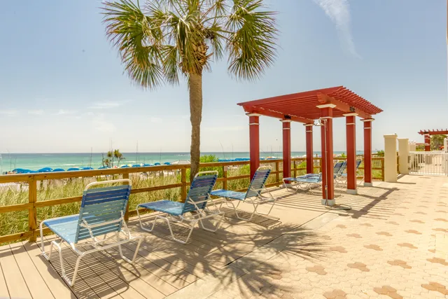 a living room with couch and a flat screen tv