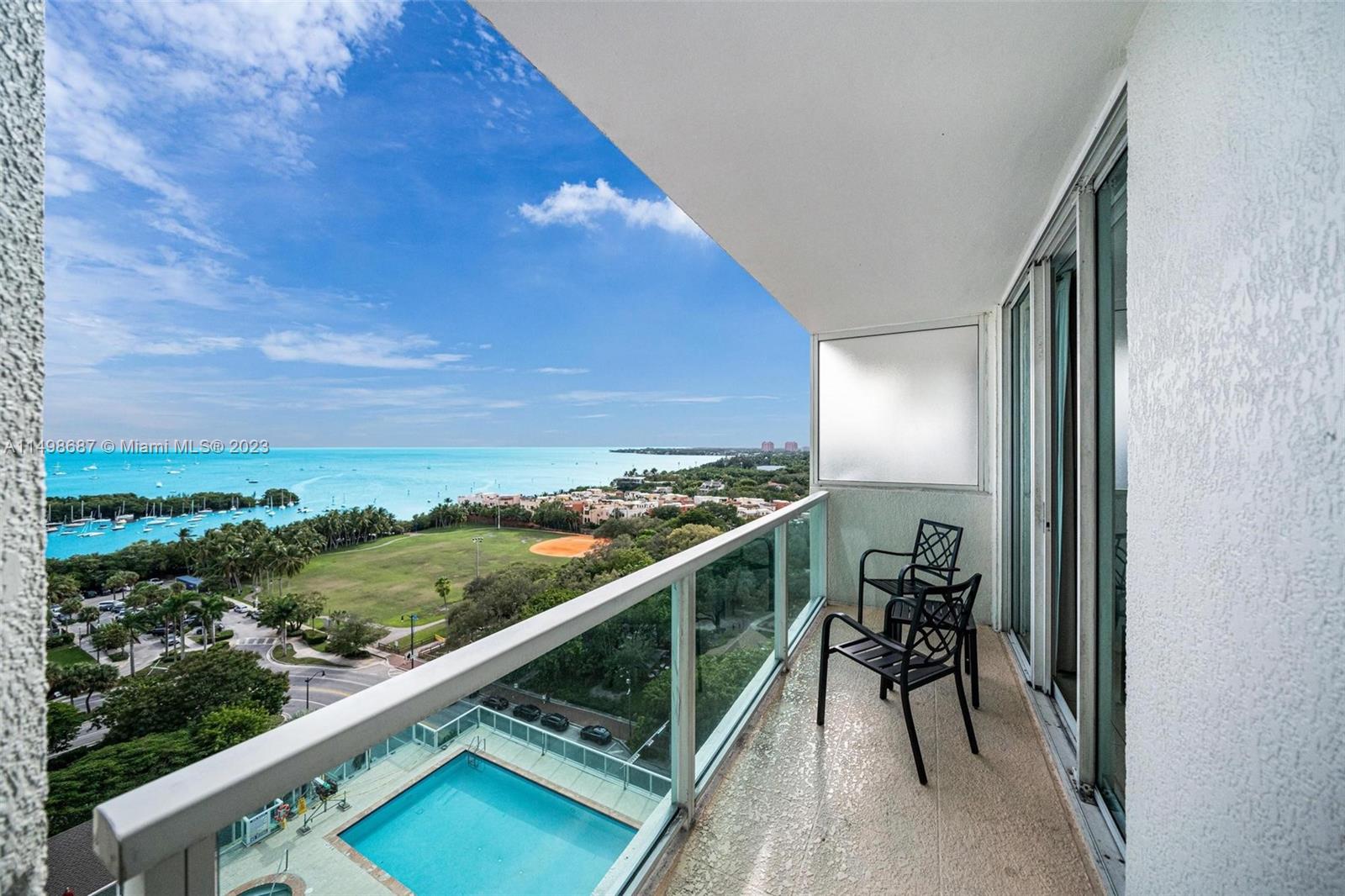 2889 McFarlane Road, Unit 1414 Miami, FL 33133 - Photo 13 of 15 a view of balcony with furniture