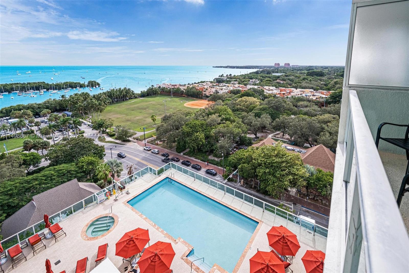2889 McFarlane Road, Unit 1414 Miami, FL 33133 - Photo 14 of 15 an aerial view of residential houses with outdoor space