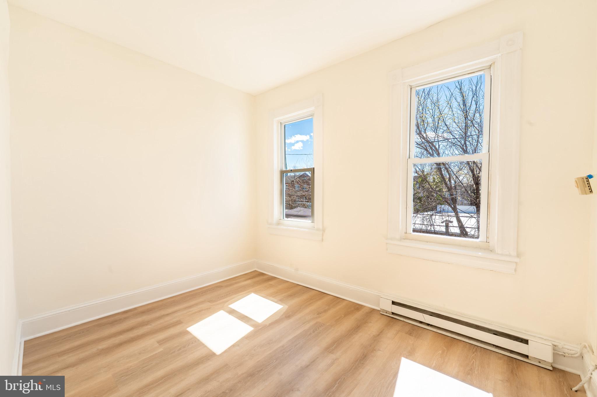 511 East 35th Street Baltimore, MD 21218 - Photo 12 of 19 a view of a room that has a window in it