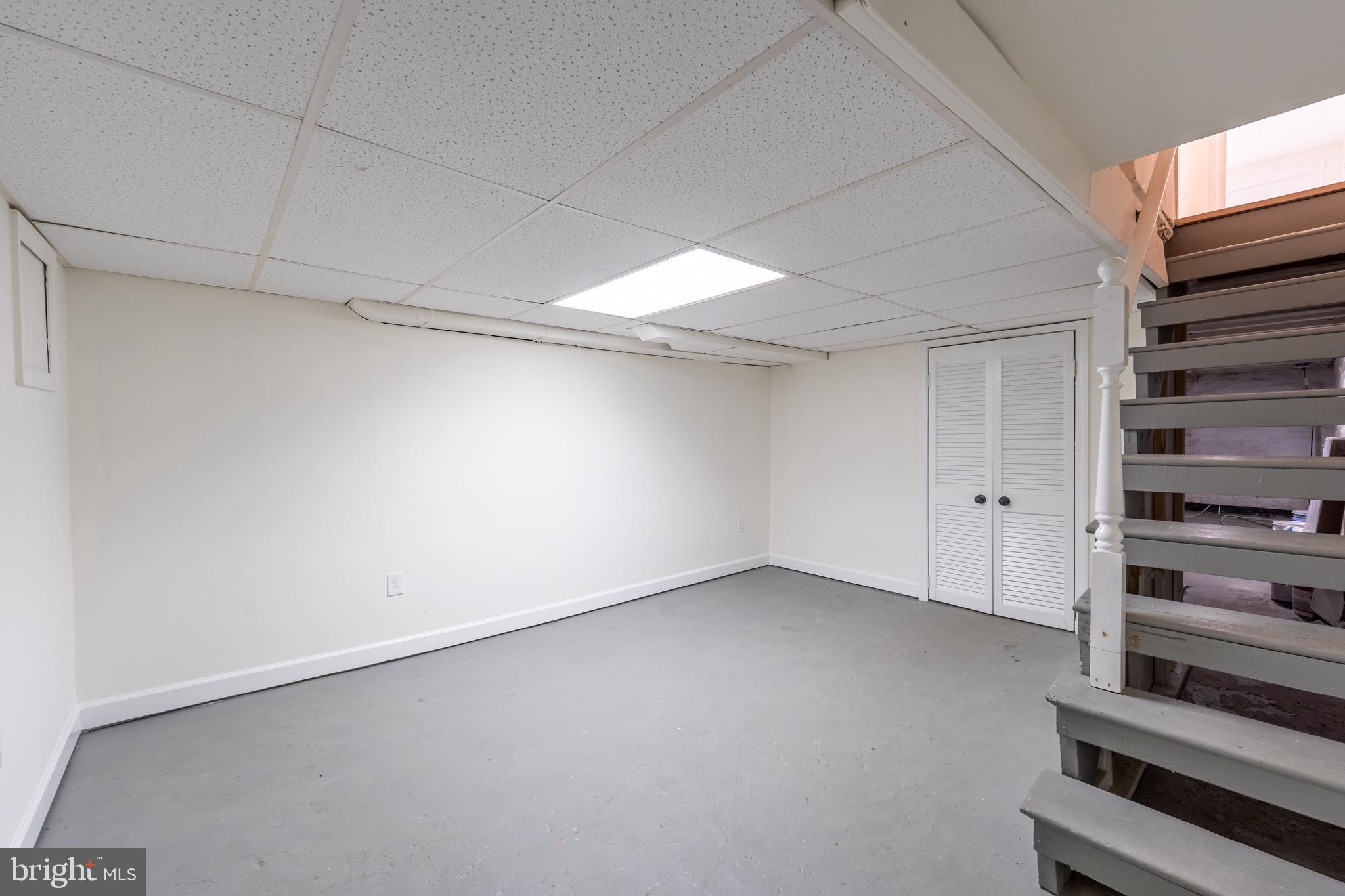 511 East 35th Street Baltimore, MD 21218 - Photo 15 of 19 a view of an empty room with a window