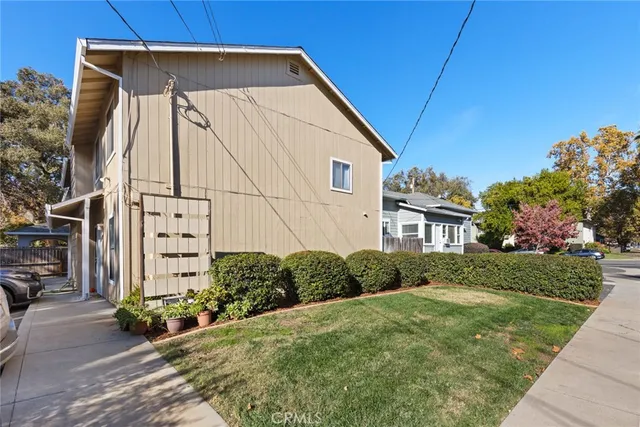 a view of a back yard of the house
